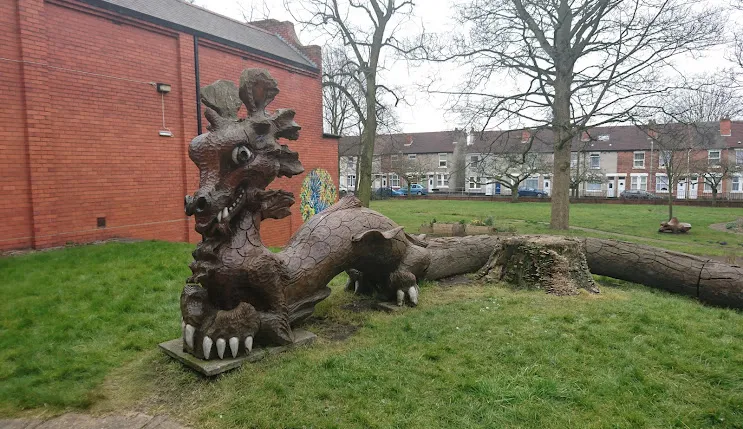 Dragon sculpture in Willenhall park, highlighting FM Auto Remapping’s local services.