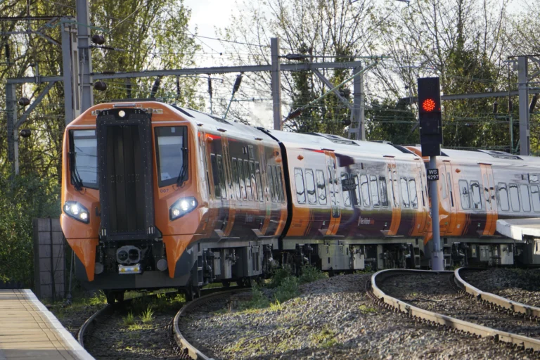 Train arriving at Wolverhampton station, highlighting connectivity and accessibility in the area.