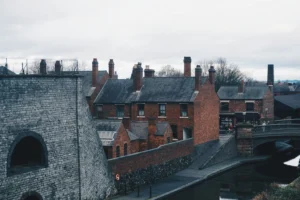 View of historic buildings and canal in Dudley, highlighting FM Auto Remapping services in the area.